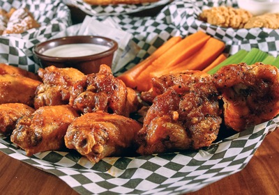 Sweet, Hot, and Everything In Between: 5 Bar-B-Q Style Wing Flavors We Can't Get Enough Of